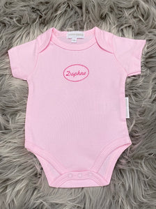 pink embroidered baby grow