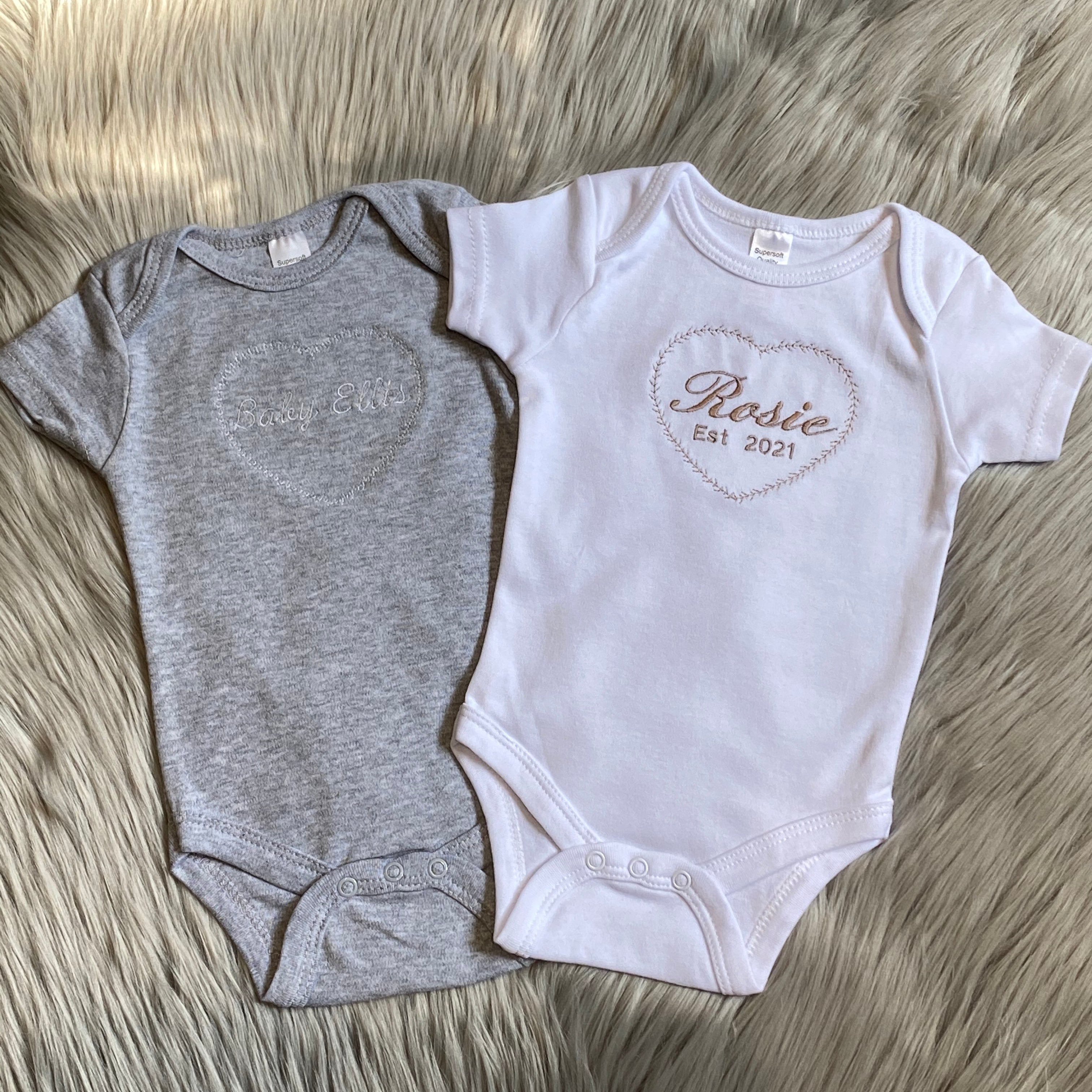 pretty embroidered baby grows