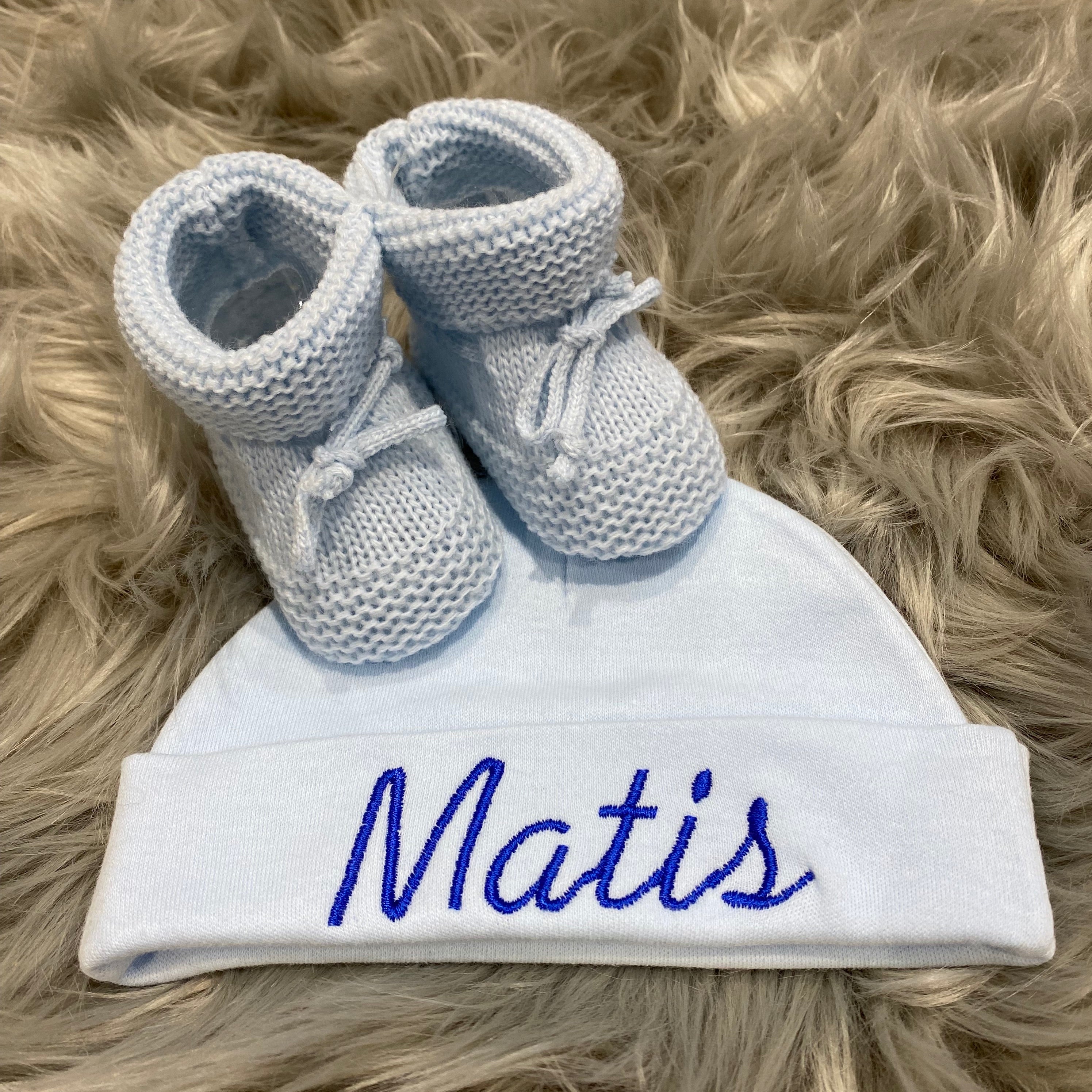 embroidered newborn blue baby hat and booties 