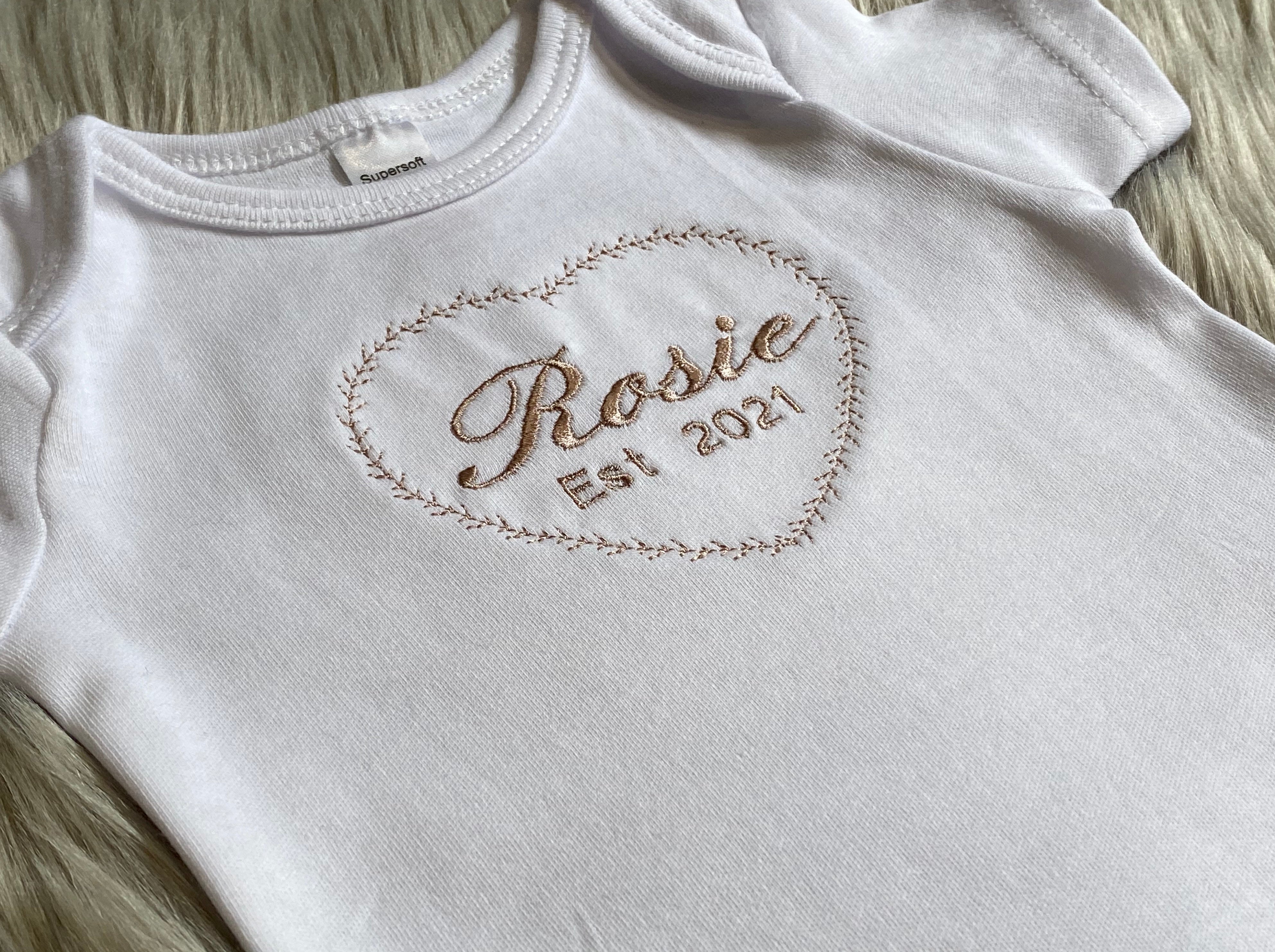 cute embroidered baby grow
