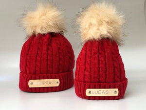 matching red knitted pom pom hats