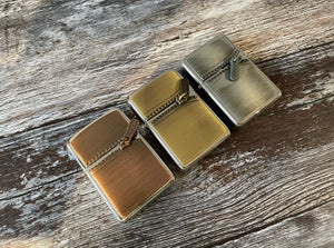 gold copper and silver lighter