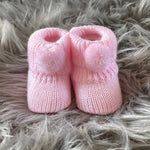 baby pink pom pom knitted baby booties